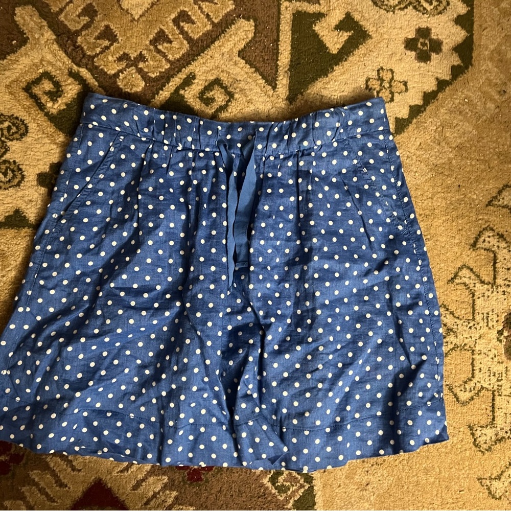 J. Crew blue and white polka dot mini skirt with tie waist.